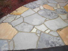 The same entrance, Wireton flagstone + a few kingston salmon stones after 3 years, showing fading of the stone